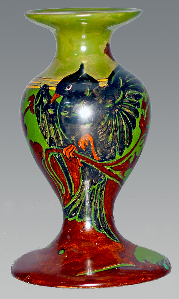 Nr.: 25, Te koop aangeboden sieraardewerk van Rozenburg, Omschrijving: Plateel kandelaar, Hoog 14,5 cm Breed 9 cm, Periode: Jaar 1900, Schilder : Onbekend, 